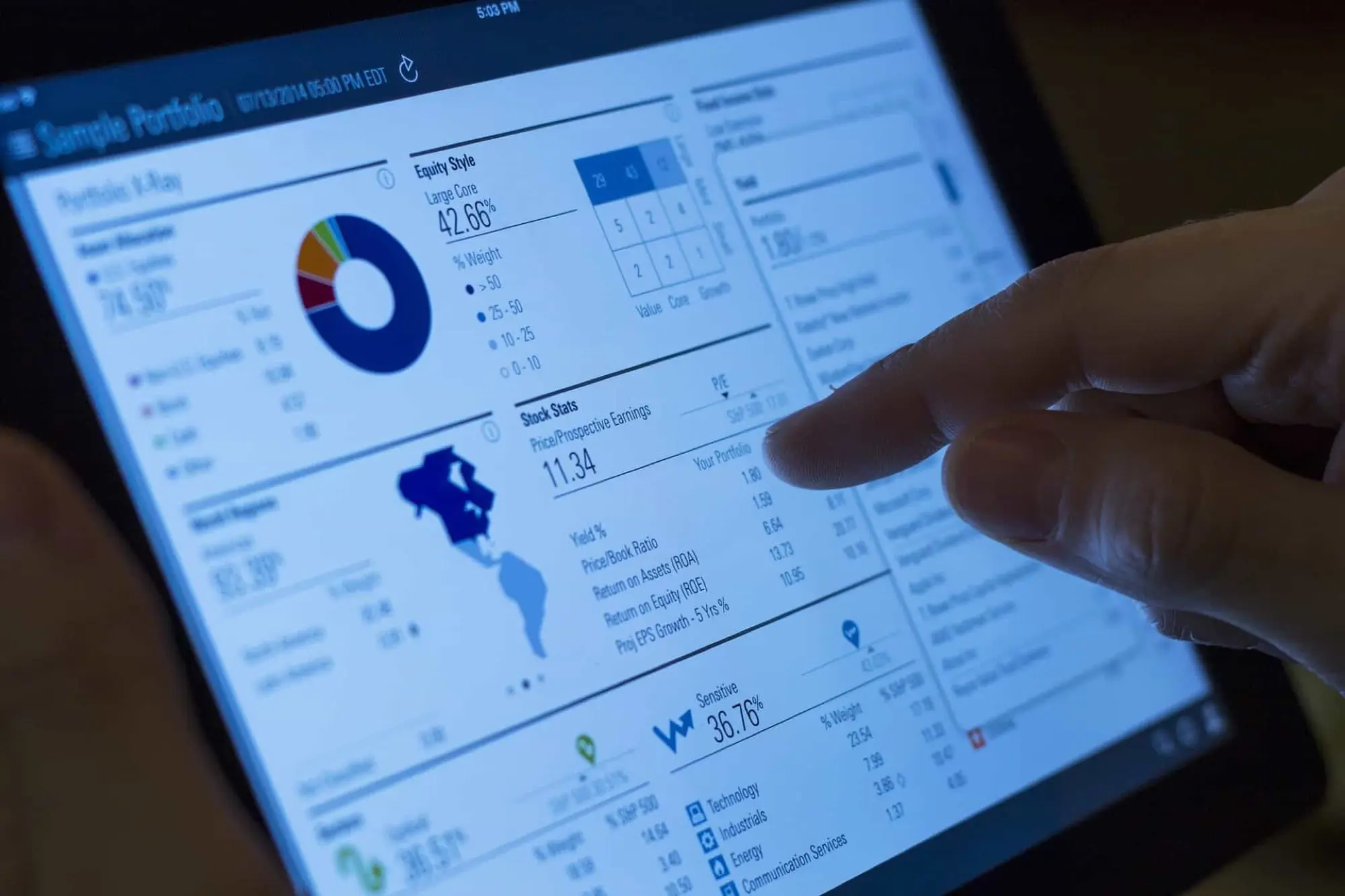 Reviewing financial figures on a tablet